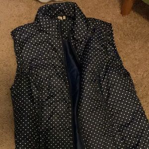 Navy blue polka dotted puffer vest